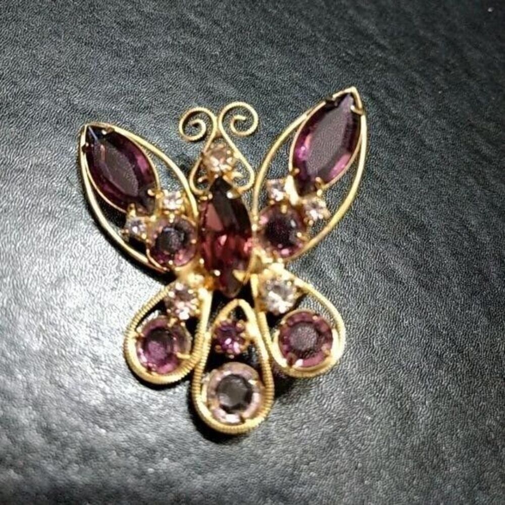 Gold tone purple rhinestone abstract butterfly brooch
